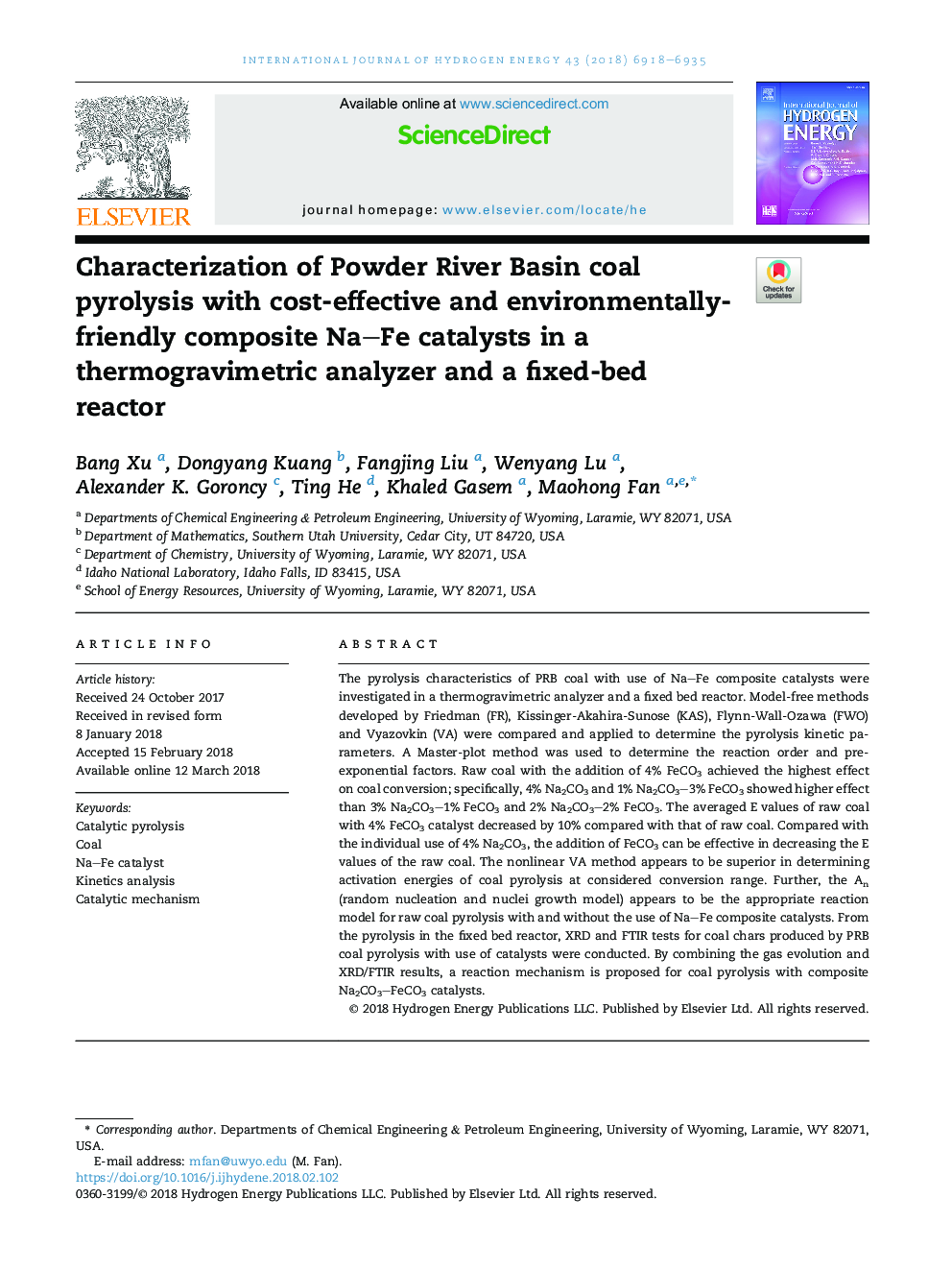 Characterization of Powder River Basin coal pyrolysis with cost-effective and environmentally-friendly composite NaFe catalysts in a thermogravimetric analyzer and a fixed-bed reactor