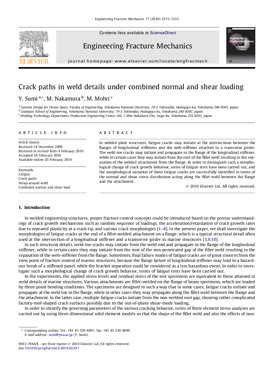 Crack paths in weld details under combined normal and shear loading