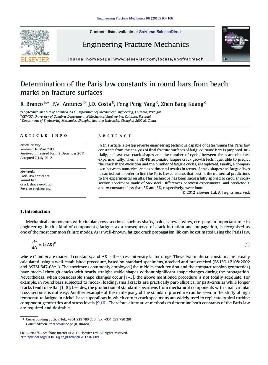 Determination of the Paris law constants in round bars from beach marks on fracture surfaces