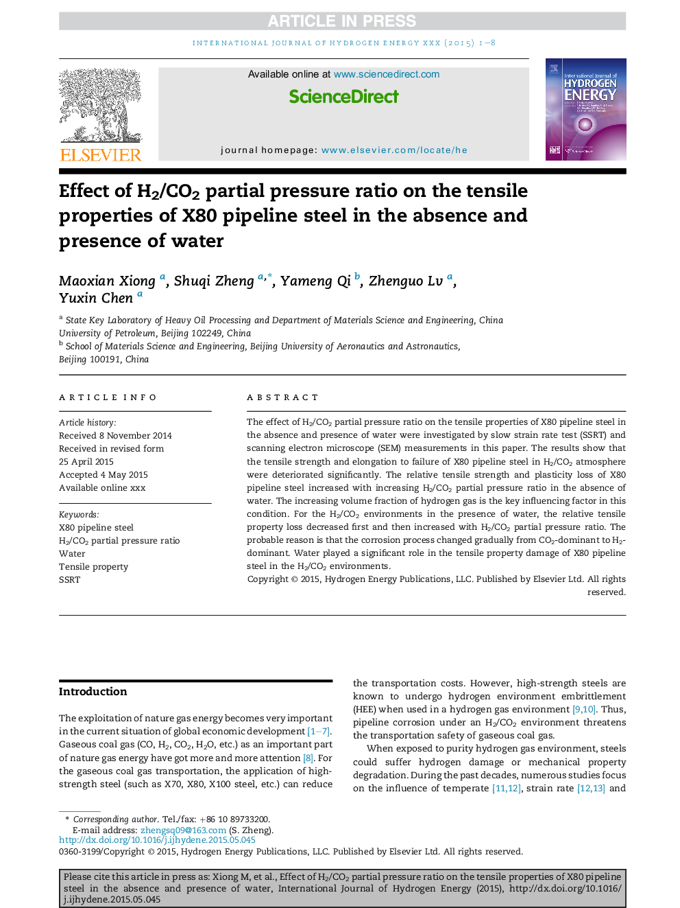 Effect of H2/CO2 partial pressure ratio on the tensile properties of X80 pipeline steel in the absence and presence of water