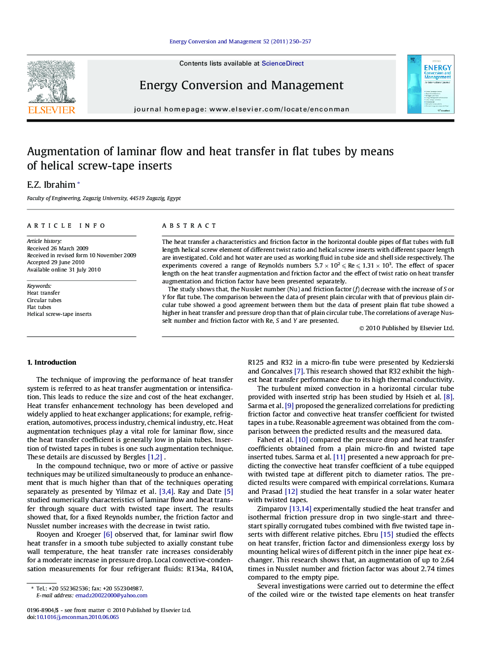 Augmentation of laminar flow and heat transfer in flat tubes by means of helical screw-tape inserts