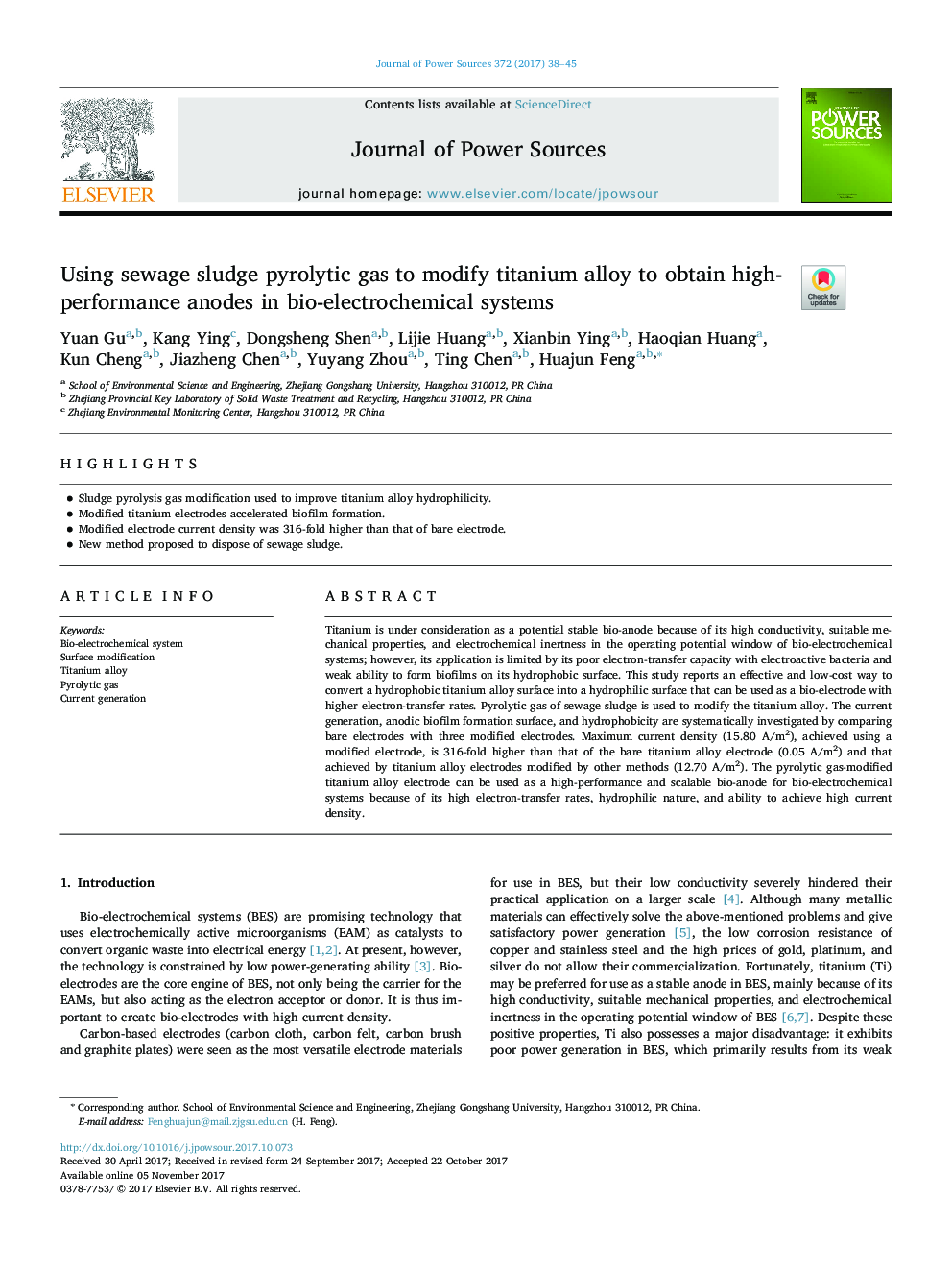 Using sewage sludge pyrolytic gas to modify titanium alloy to obtain high-performance anodes in bio-electrochemical systems