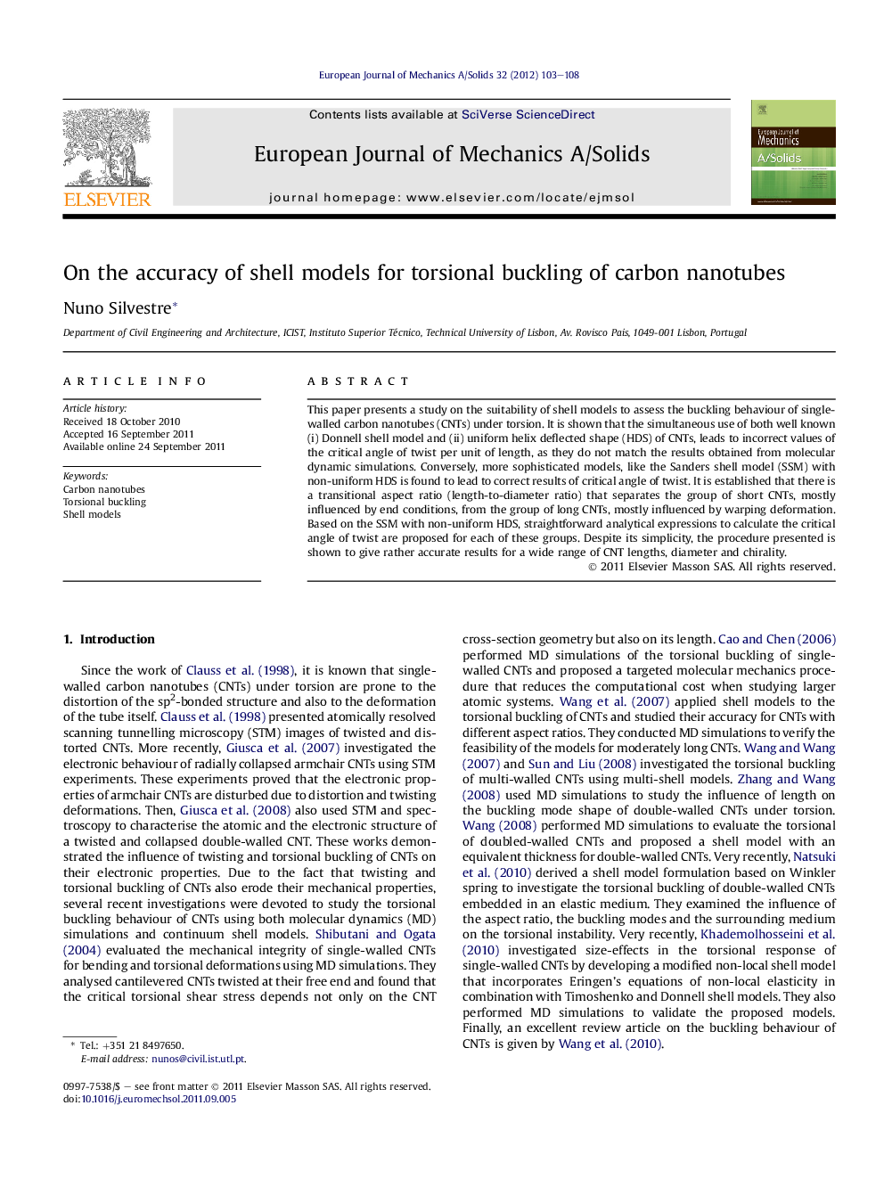 On the accuracy of shell models for torsional buckling of carbon nanotubes