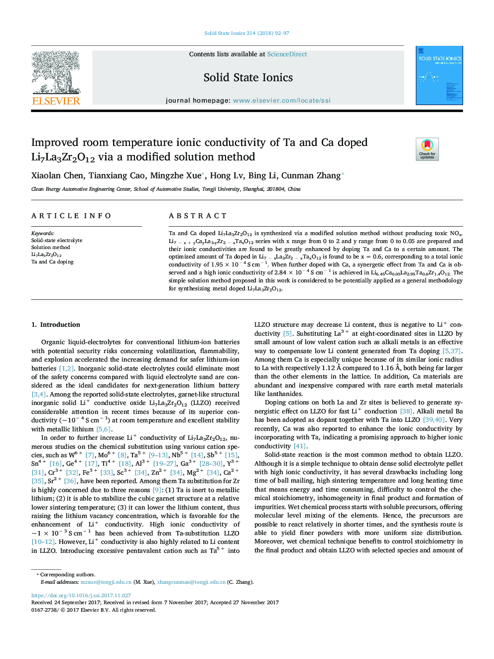 Improved room temperature ionic conductivity of Ta and Ca doped Li7La3Zr2O12 via a modified solution method