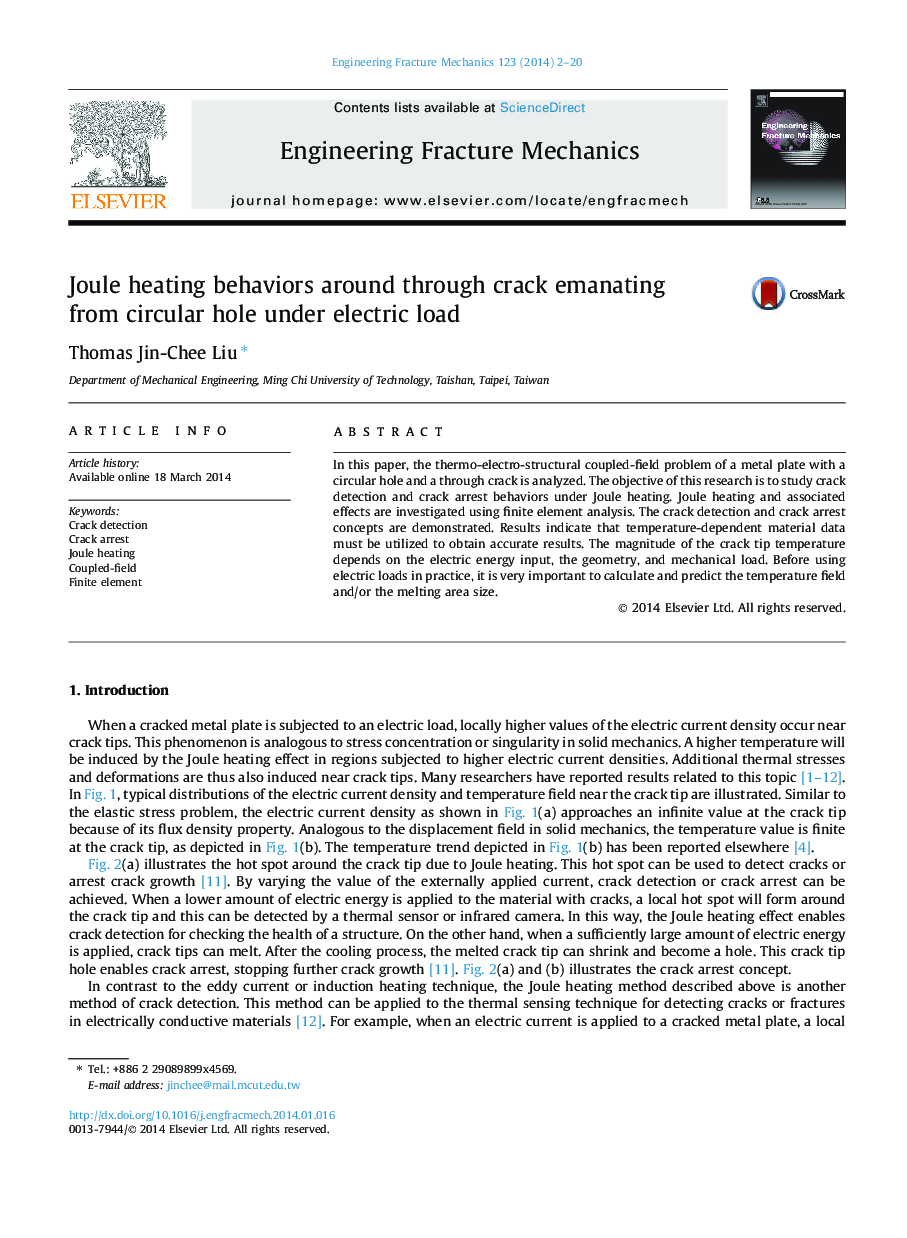 Joule heating behaviors around through crack emanating from circular hole under electric load