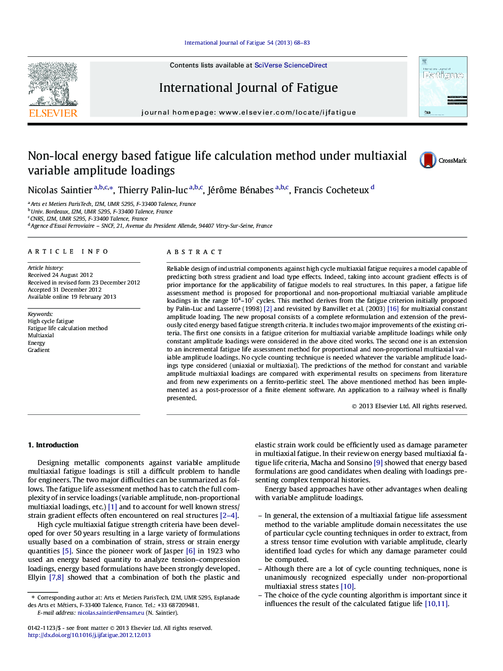 Non-local energy based fatigue life calculation method under multiaxial variable amplitude loadings