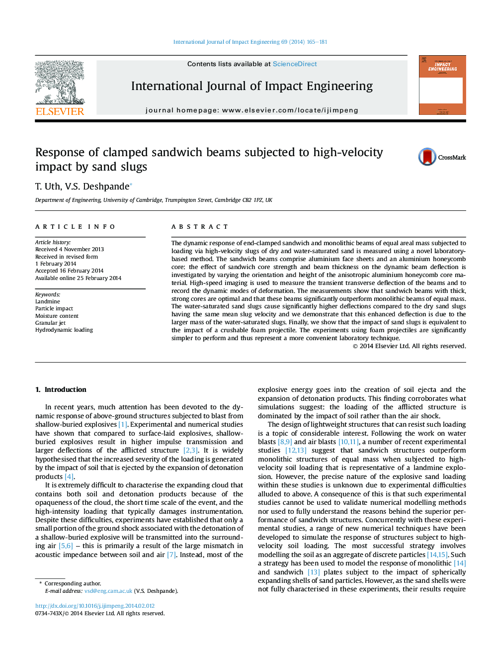 Response of clamped sandwich beams subjected to high-velocity impact by sand slugs