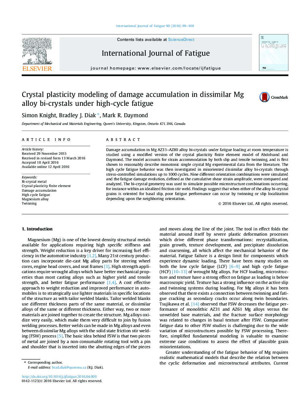 Crystal plasticity modeling of damage accumulation in dissimilar Mg alloy bi-crystals under high-cycle fatigue