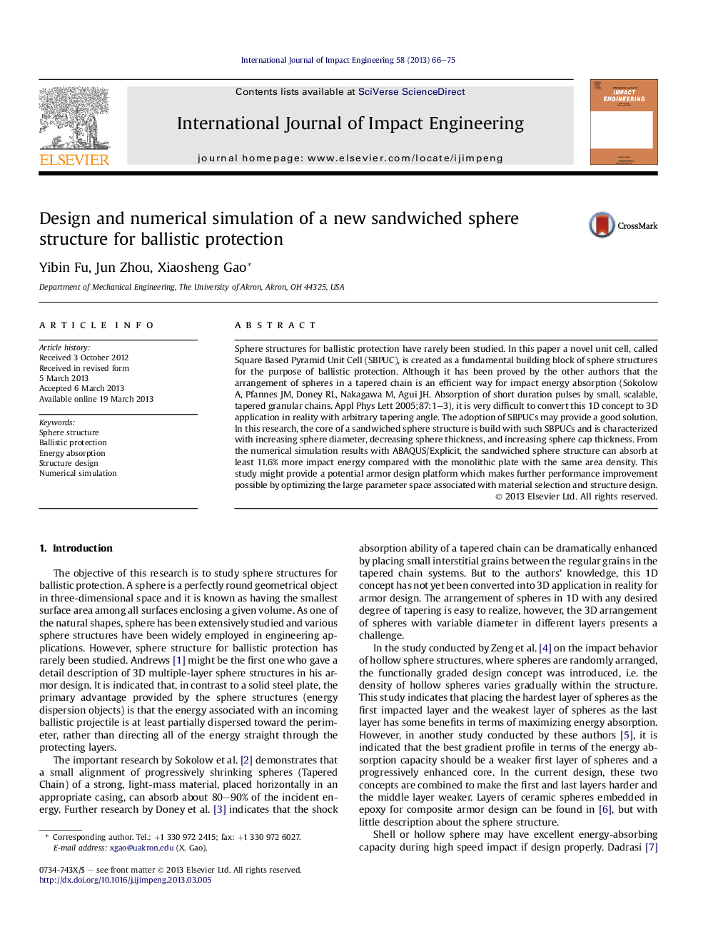 Design and numerical simulation of a new sandwiched sphere structure for ballistic protection