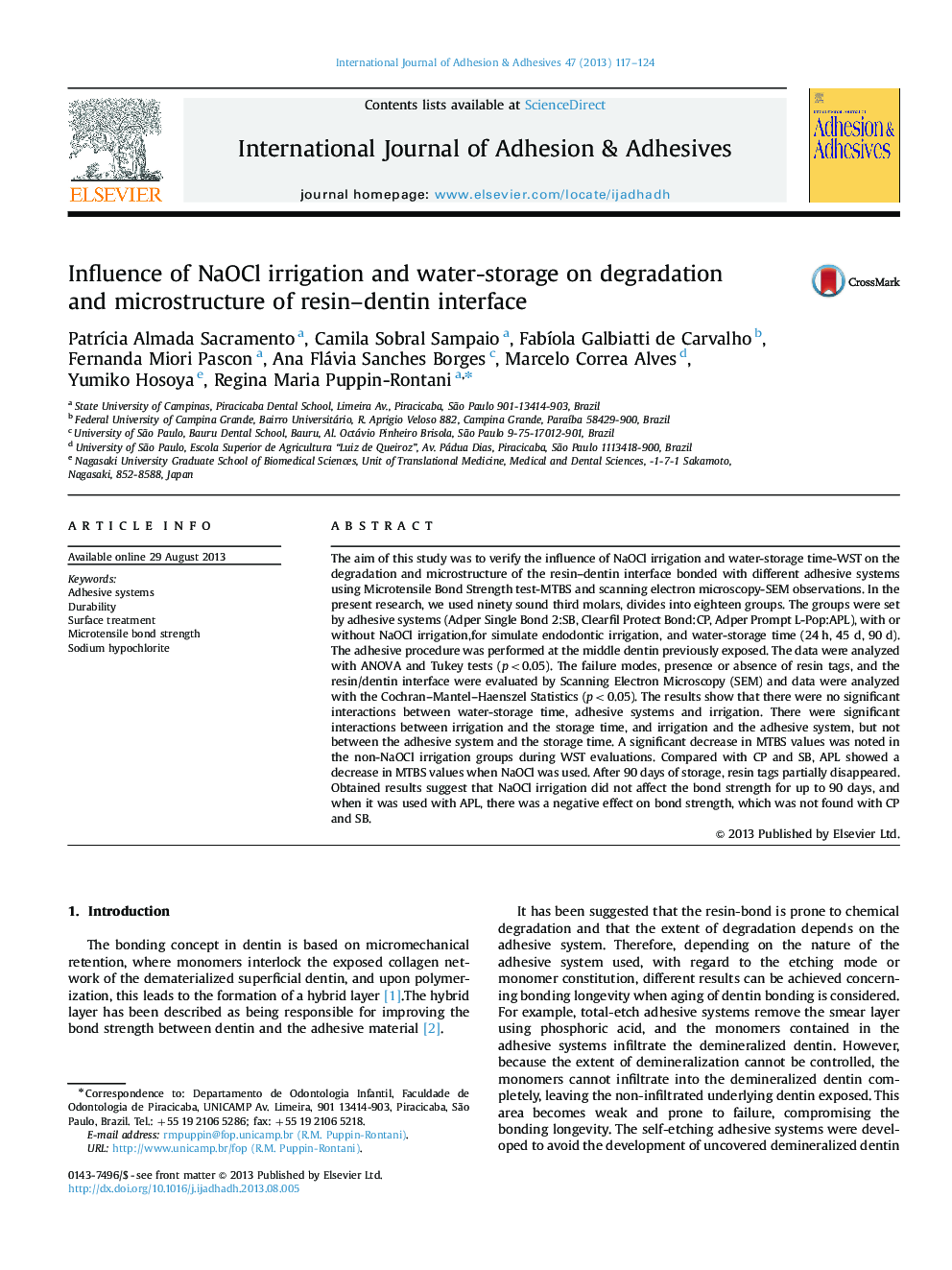Influence of NaOCl irrigation and water-storage on degradation and microstructure of resin–dentin interface