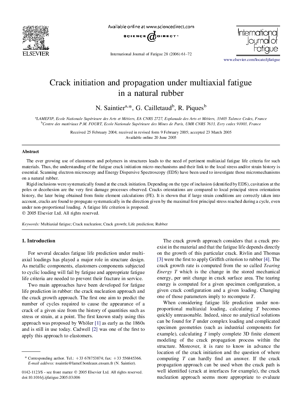 Crack initiation and propagation under multiaxial fatigue in a natural rubber