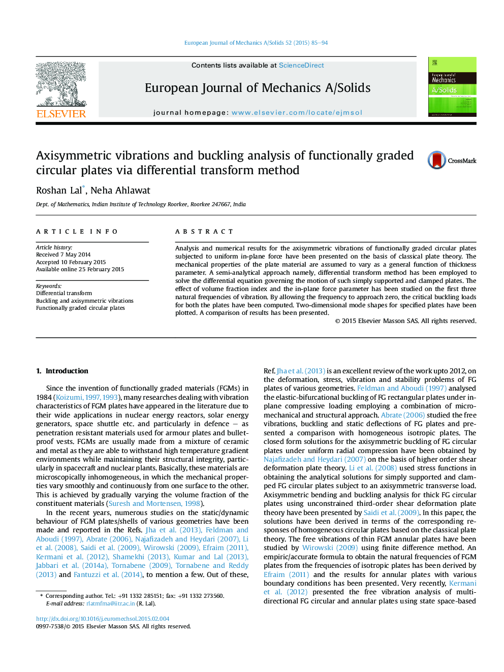 Axisymmetric vibrations and buckling analysis of functionally graded circular plates via differential transform method