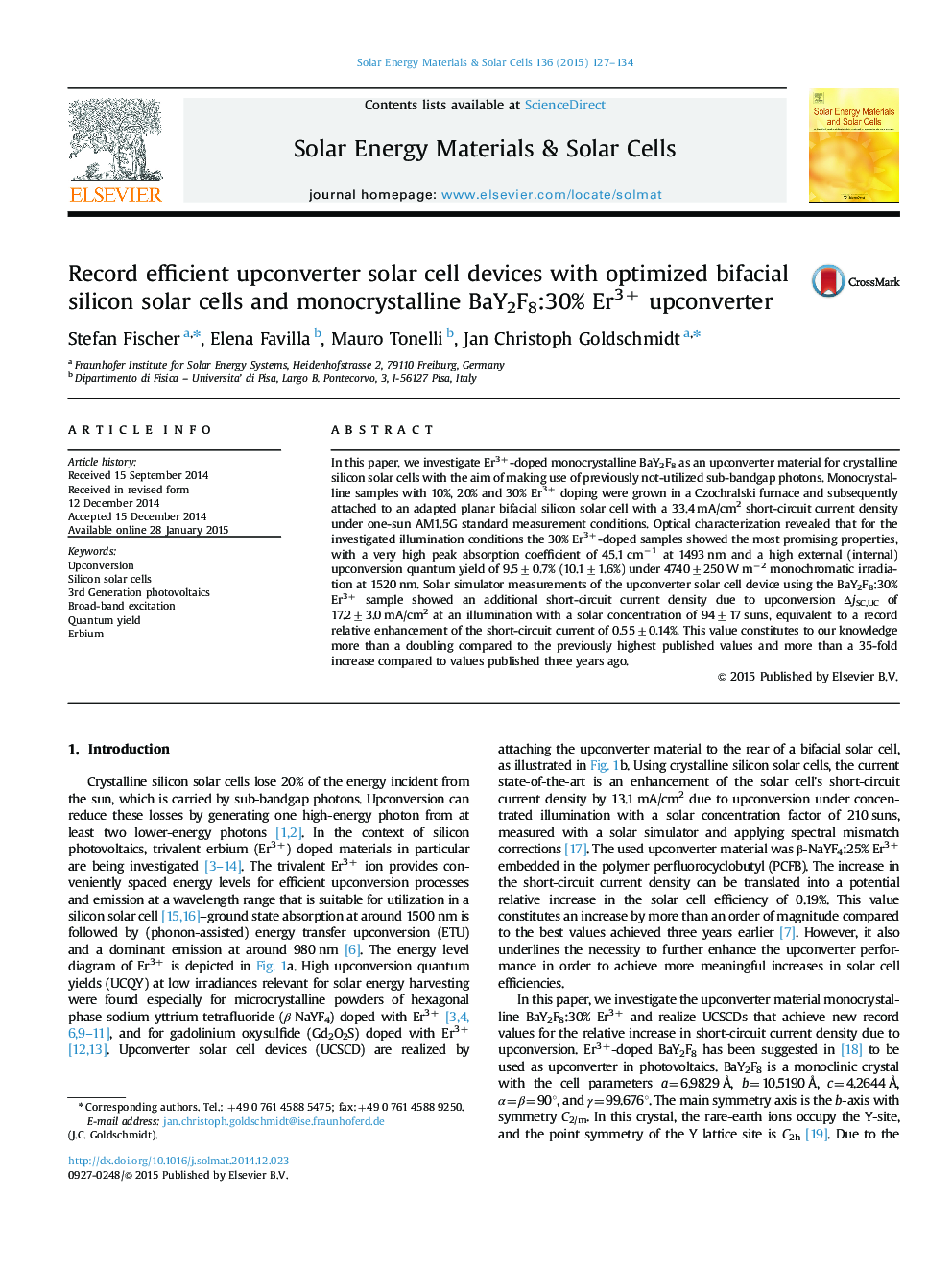 Record efficient upconverter solar cell devices with optimized bifacial silicon solar cells and monocrystalline BaY2F8:30% Er3+ upconverter