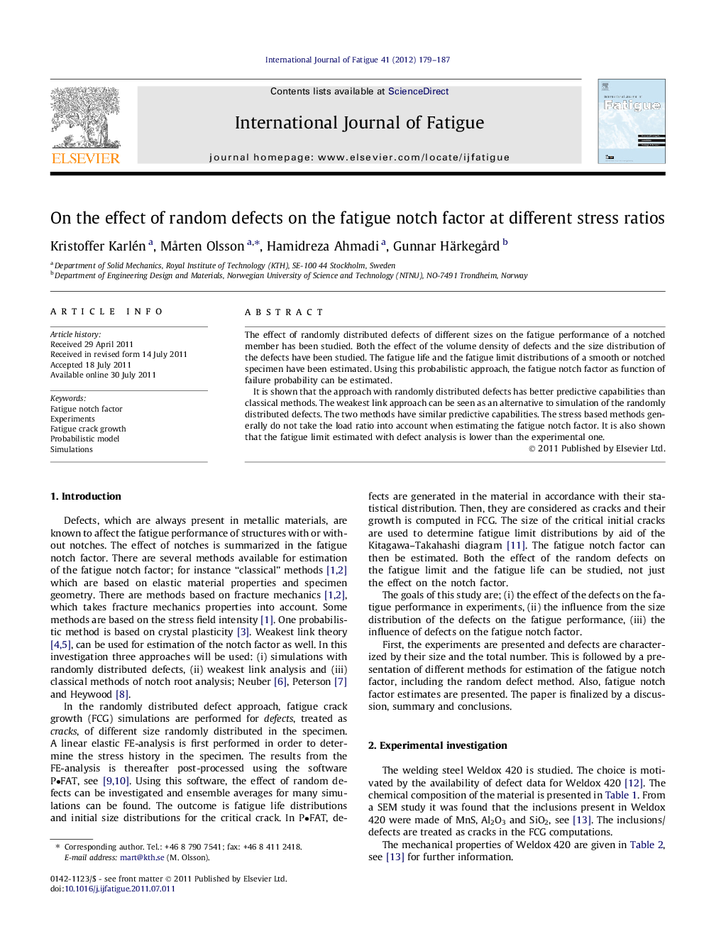 On the effect of random defects on the fatigue notch factor at different stress ratios