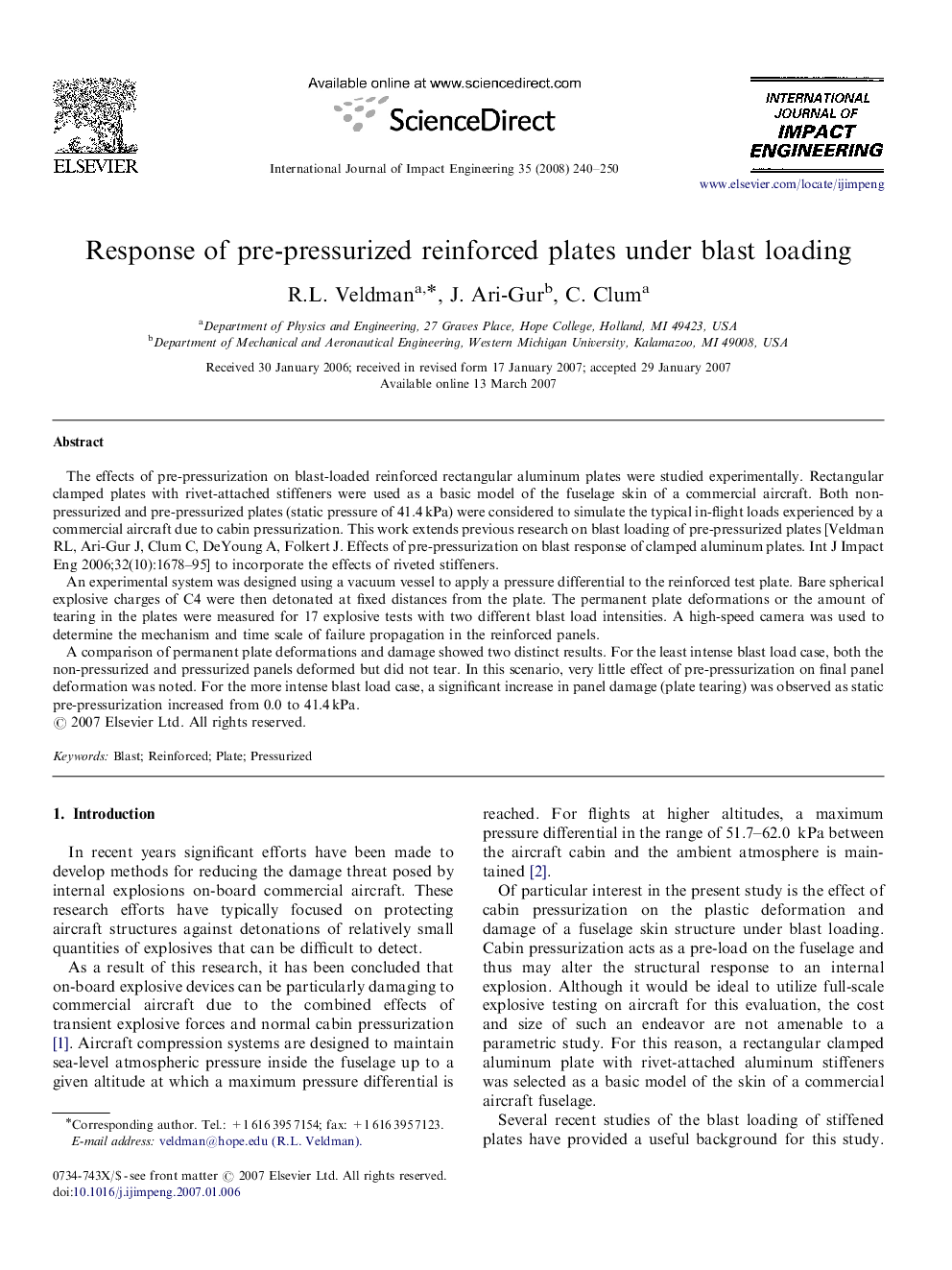 Response of pre-pressurized reinforced plates under blast loading