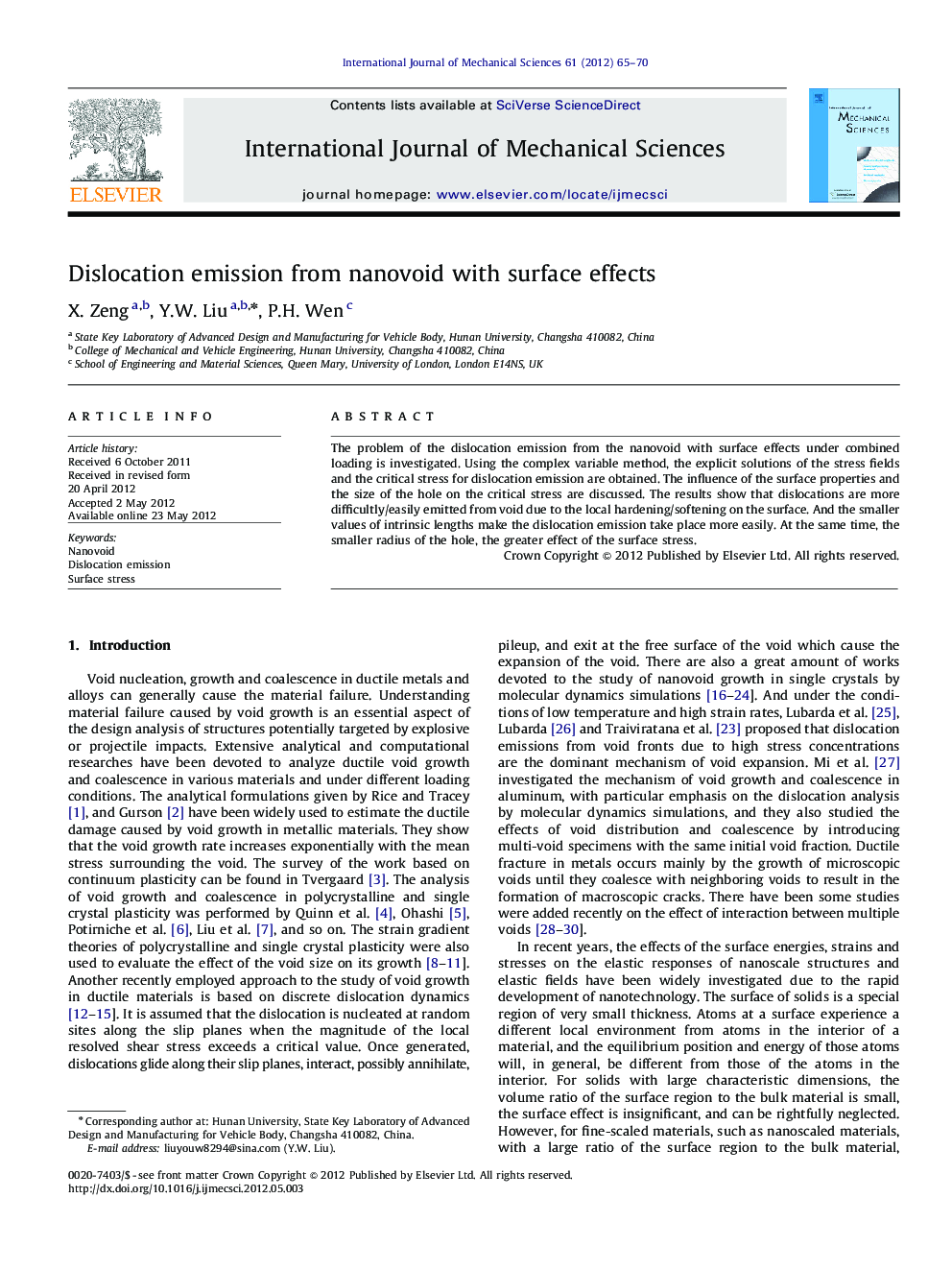 Dislocation emission from nanovoid with surface effects