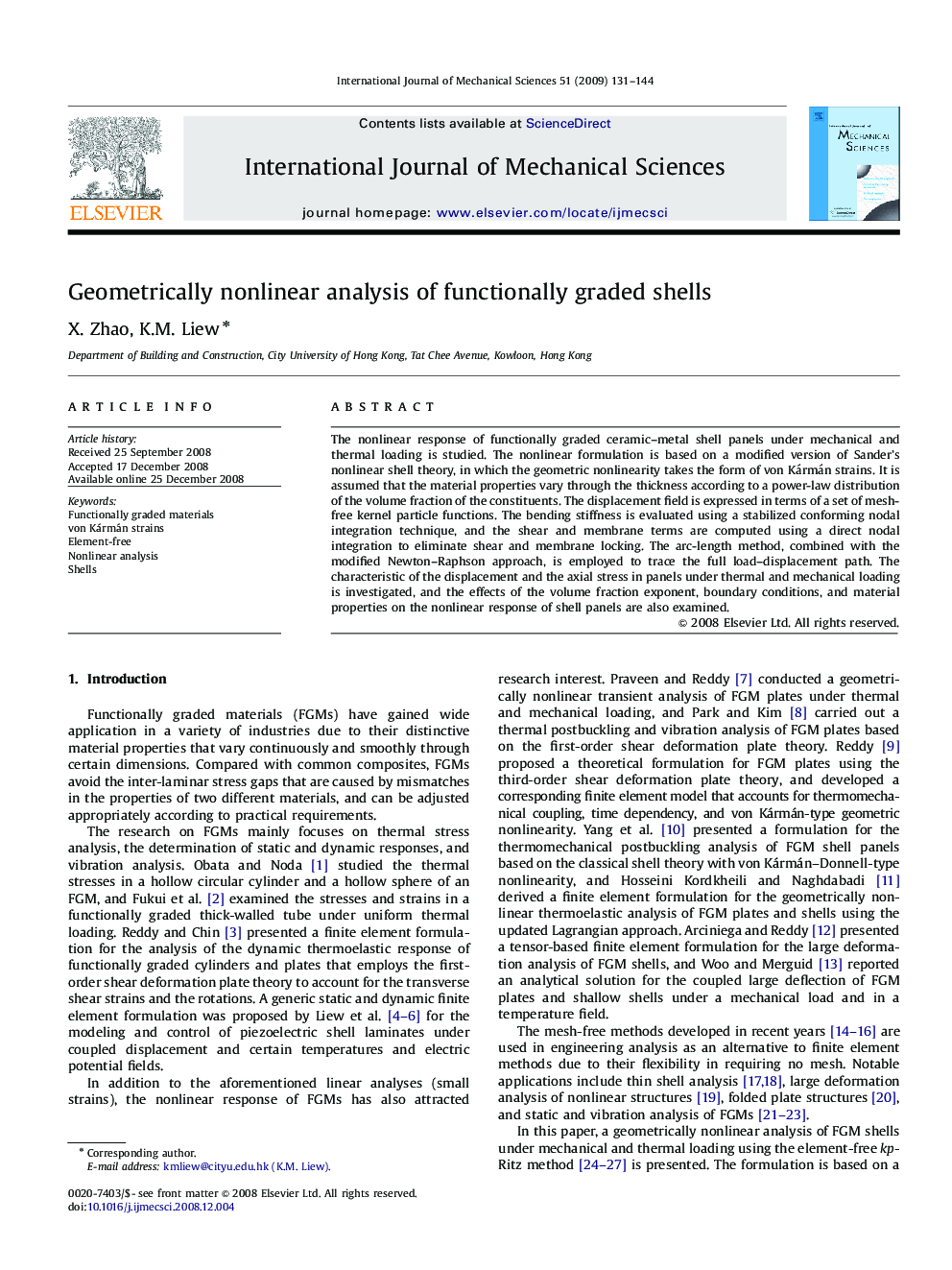 Geometrically nonlinear analysis of functionally graded shells