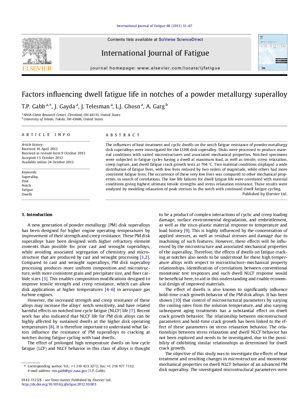 Factors influencing dwell fatigue life in notches of a powder metallurgy superalloy