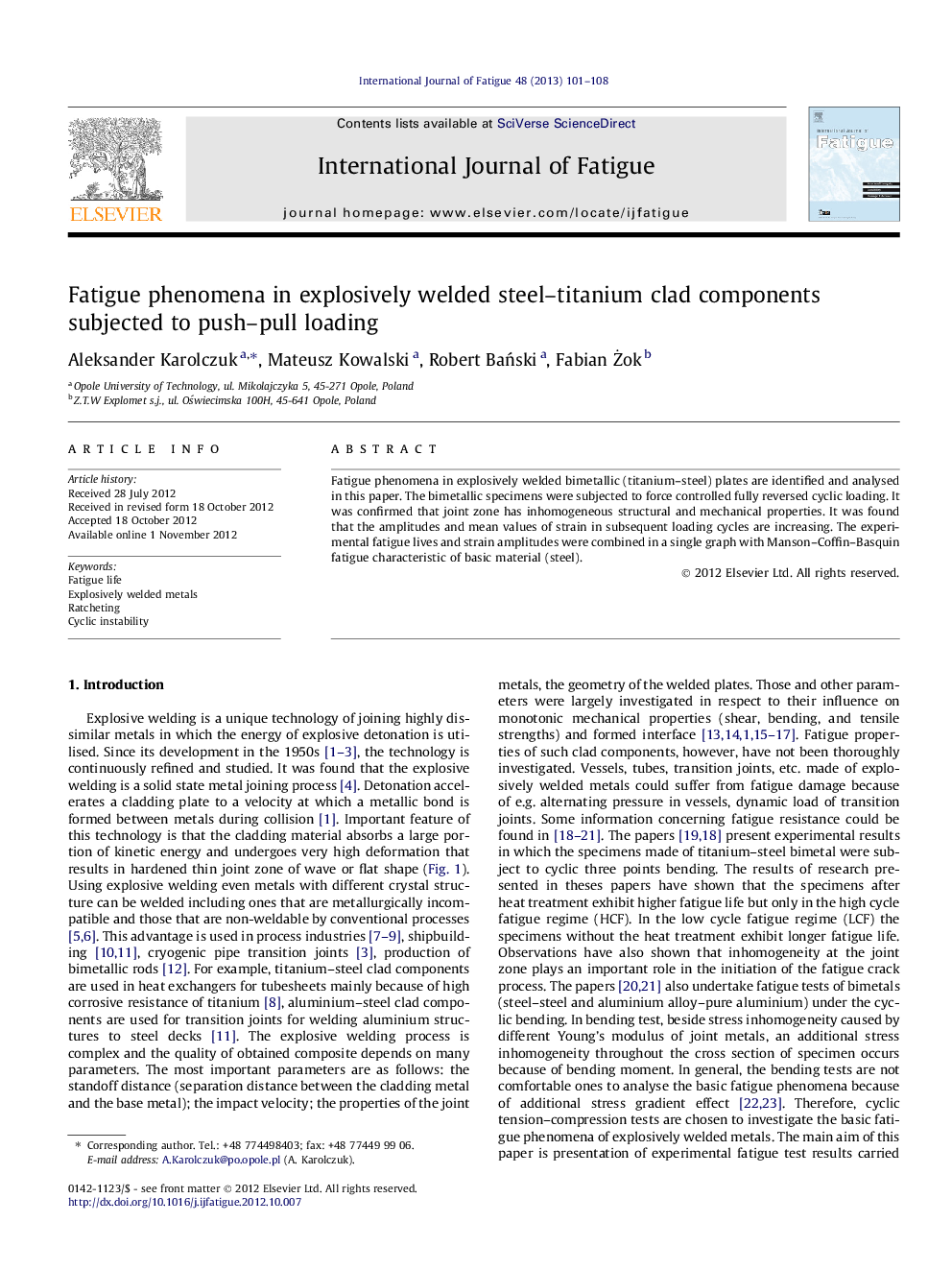 Fatigue phenomena in explosively welded steel–titanium clad components subjected to push–pull loading