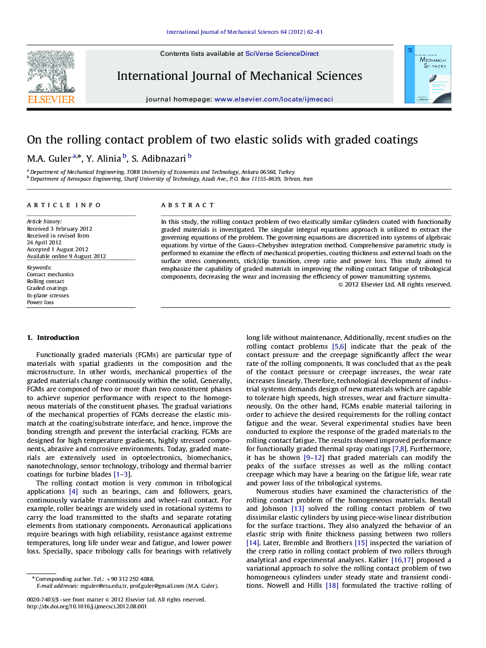 On the rolling contact problem of two elastic solids with graded coatings