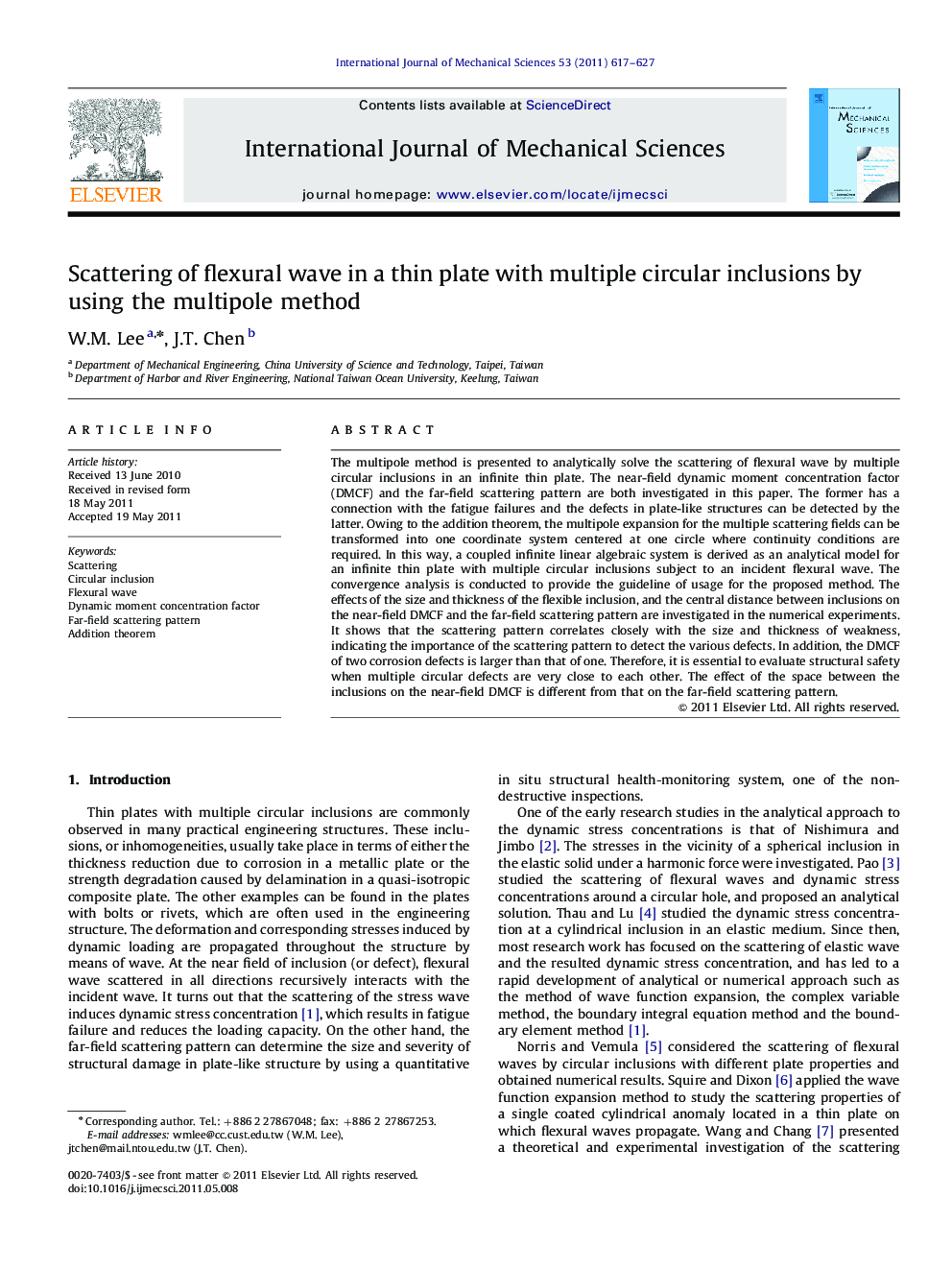 Scattering of flexural wave in a thin plate with multiple circular inclusions by using the multipole method