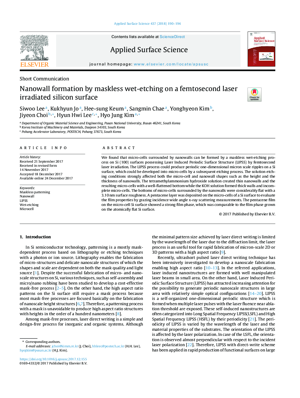 Nanowall formation by maskless wet-etching on a femtosecond laser irradiated silicon surface