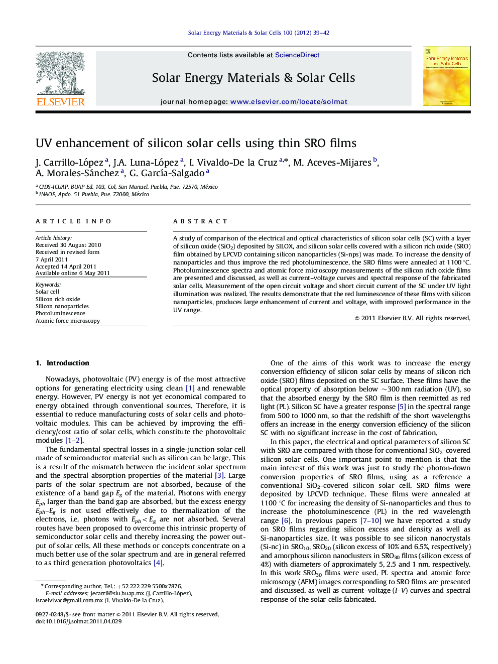 UV enhancement of silicon solar cells using thin SRO films