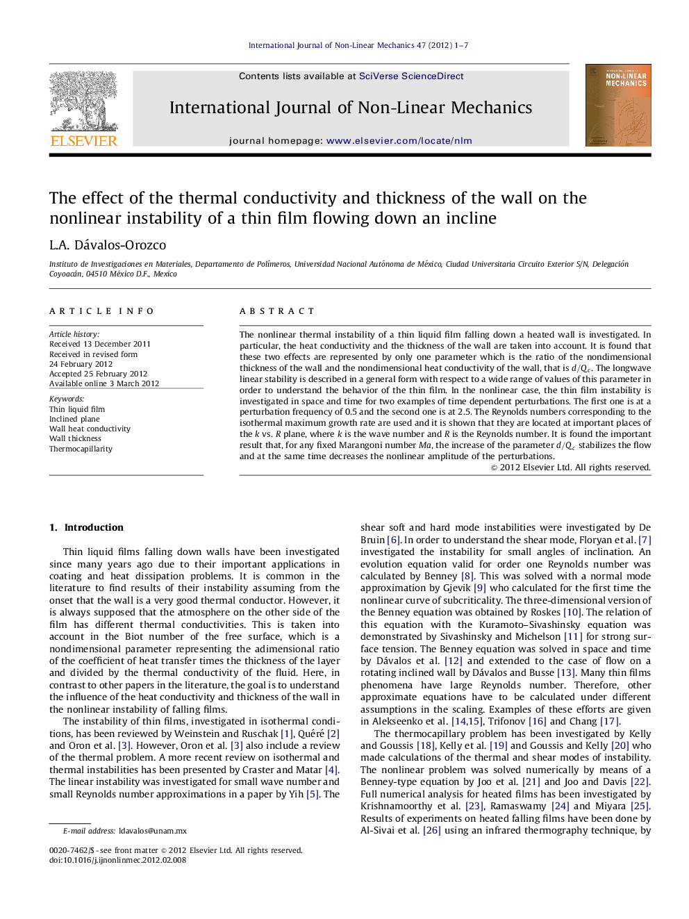 The effect of the thermal conductivity and thickness of the wall on the nonlinear instability of a thin film flowing down an incline