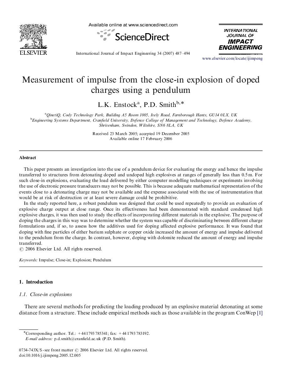 Measurement of impulse from the close-in explosion of doped charges using a pendulum