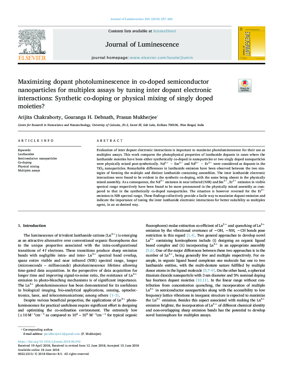 Maximizing dopant photoluminescence in co-doped semiconductor nanoparticles for multiplex assays by tuning inter dopant electronic interactions: Synthetic co-doping or physical mixing of singly doped moieties?