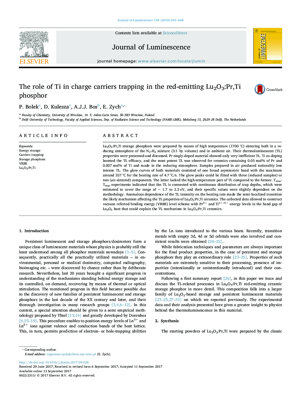 The role of Ti in charge carriers trapping in the red-emitting Lu2O3:Pr,Ti phosphor