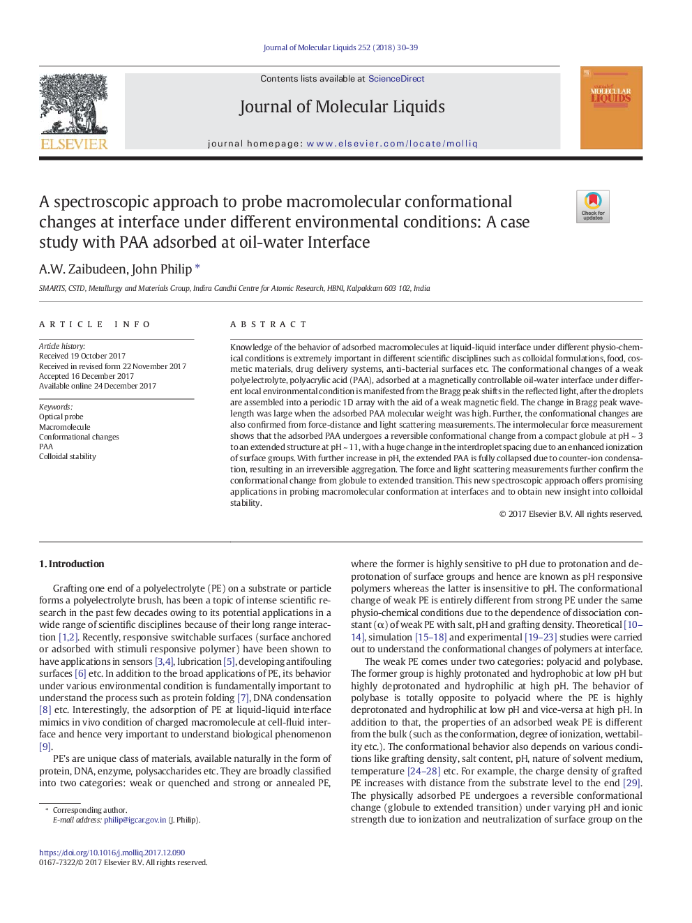 A spectroscopic approach to probe macromolecular conformational changes at interface under different environmental conditions: A case study with PAA adsorbed at oil-water Interface