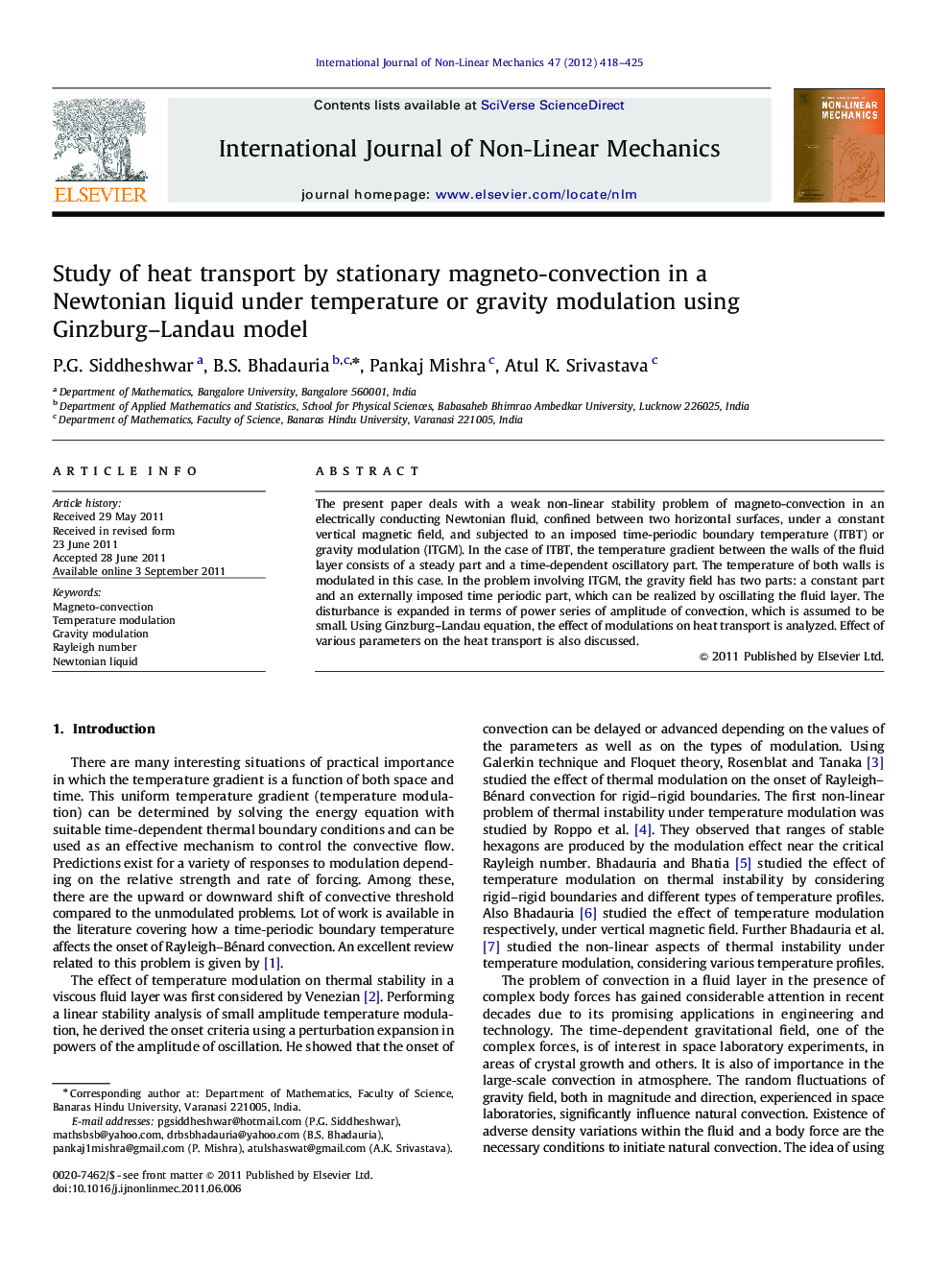 Study of heat transport by stationary magneto-convection in a Newtonian liquid under temperature or gravity modulation using Ginzburg–Landau model