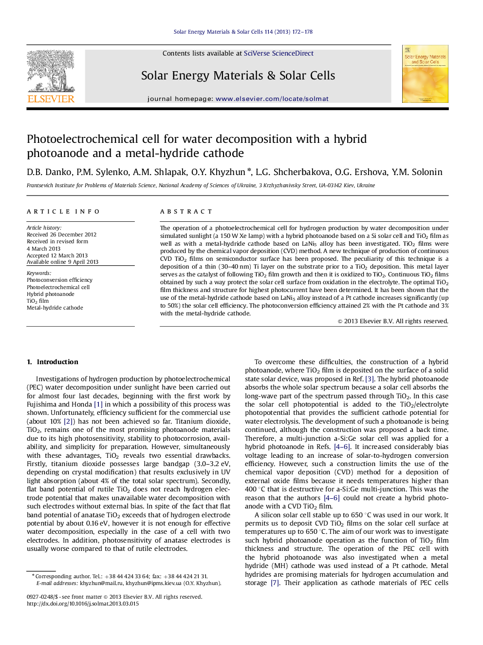 Photoelectrochemical cell for water decomposition with a hybrid photoanode and a metal-hydride cathode