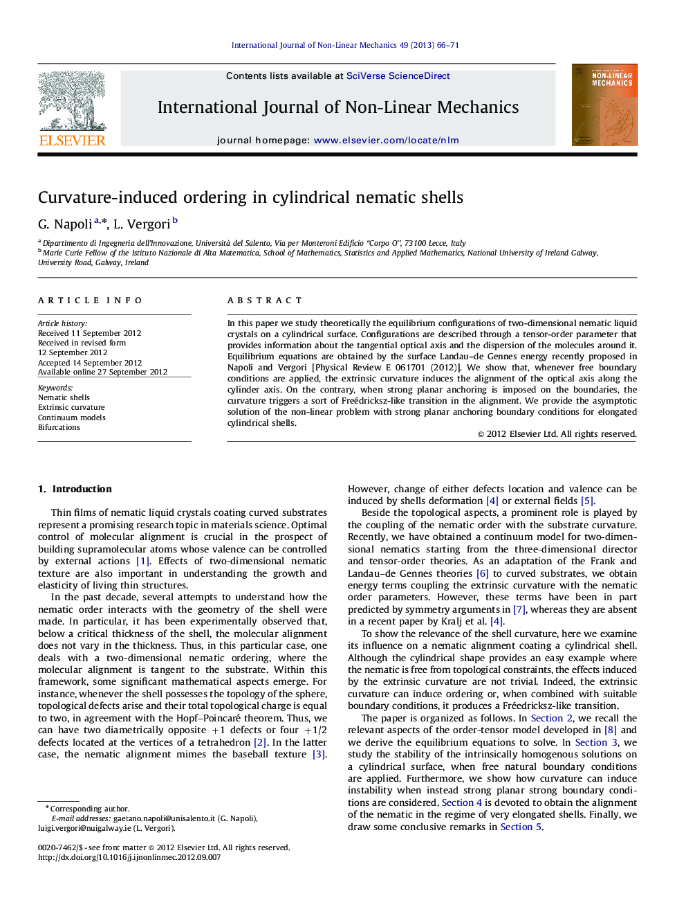 Curvature-induced ordering in cylindrical nematic shells