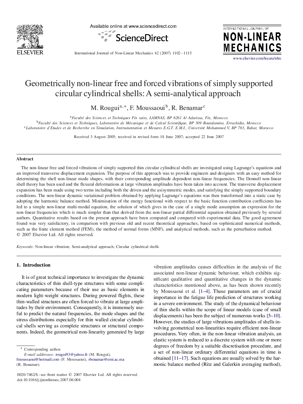 Geometrically non-linear free and forced vibrations of simply supported circular cylindrical shells: A semi-analytical approach