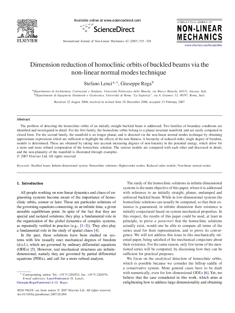 Dimension reduction of homoclinic orbits of buckled beams via the non-linear normal modes technique