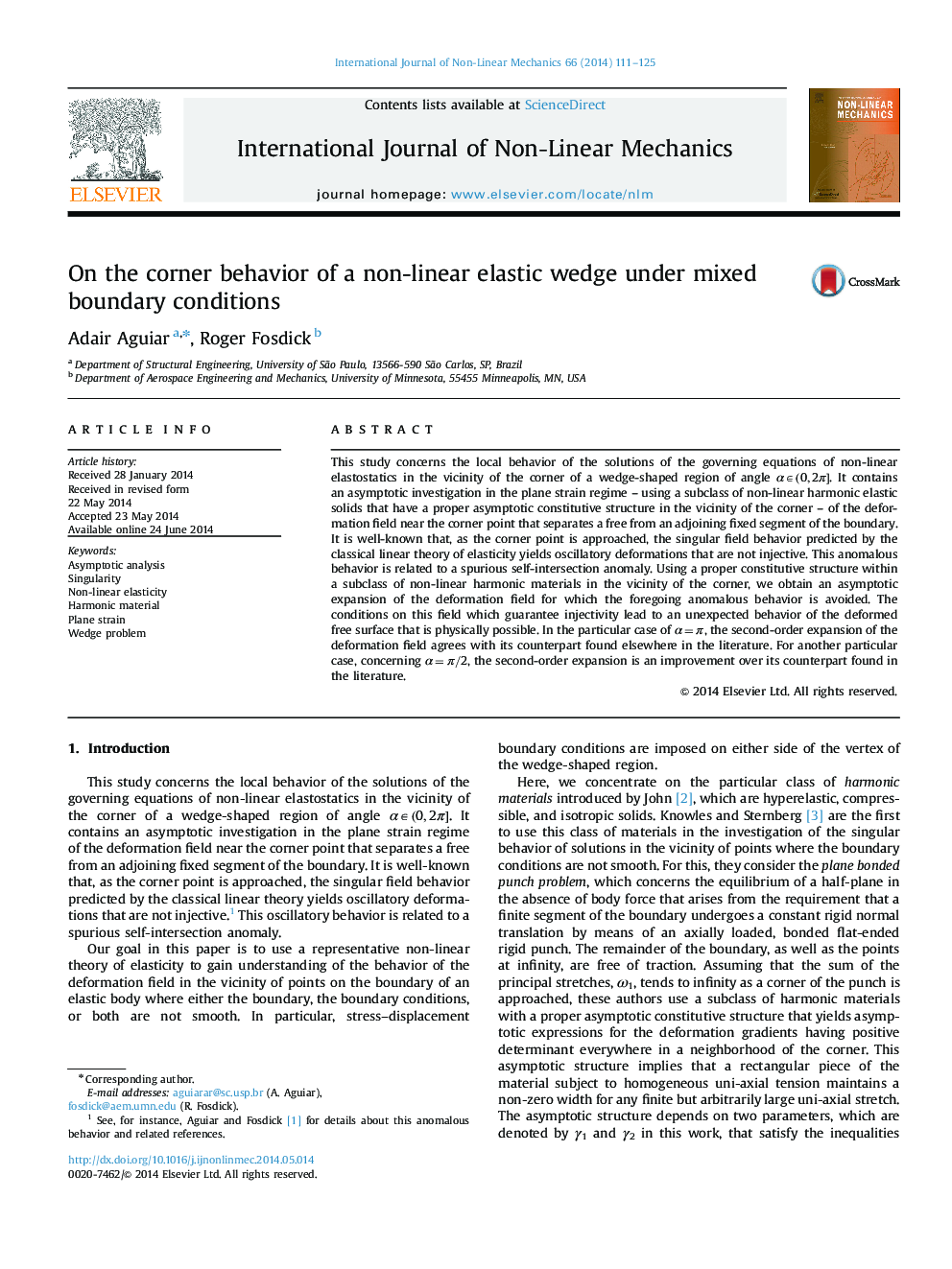 On the corner behavior of a non-linear elastic wedge under mixed boundary conditions