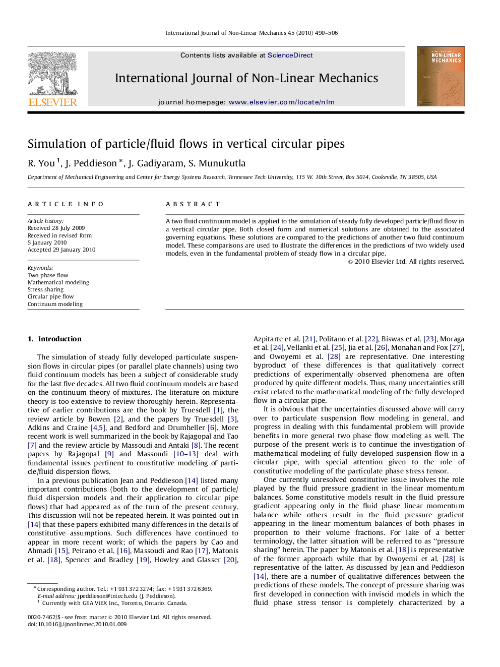 Simulation of particle/fluid flows in vertical circular pipes