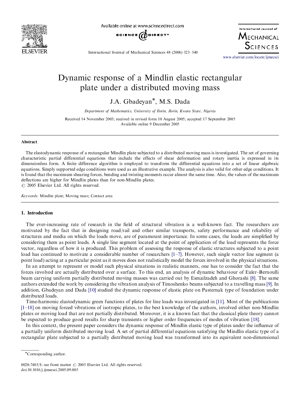 Dynamic response of a Mindlin elastic rectangular plate under a distributed moving mass