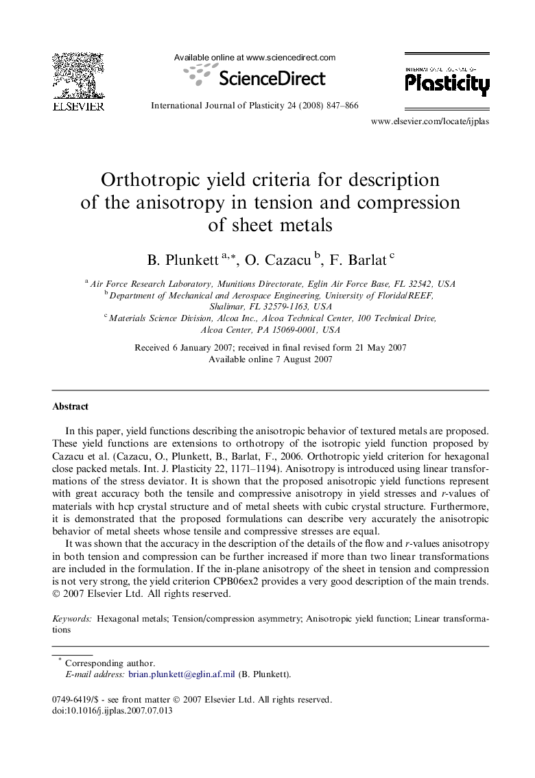 Orthotropic yield criteria for description of the anisotropy in tension and compression of sheet metals