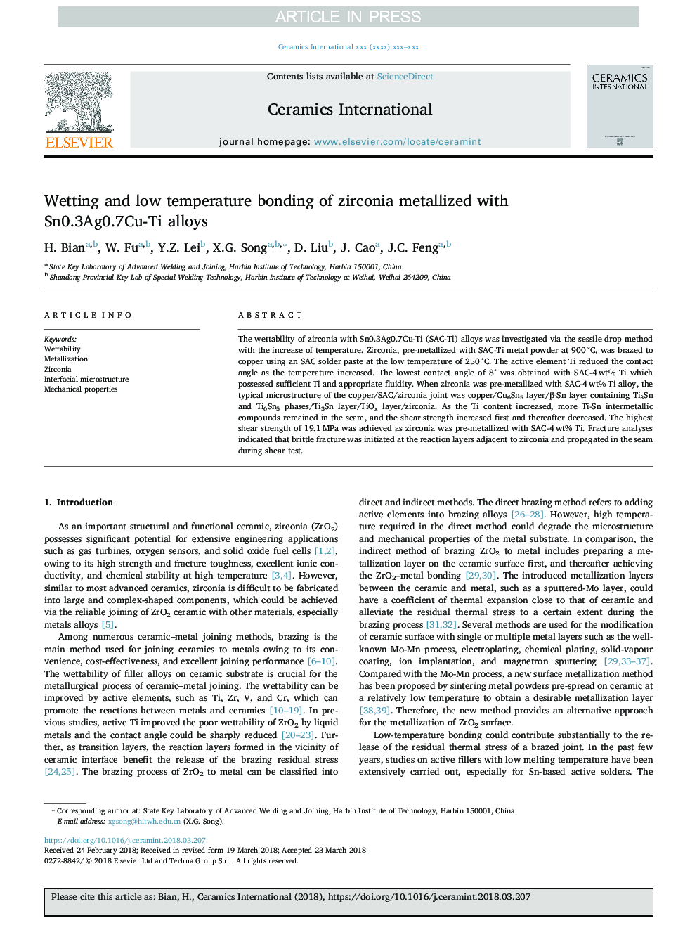 Wetting and low temperature bonding of zirconia metallized with Sn0.3Ag0.7Cu-Ti alloys