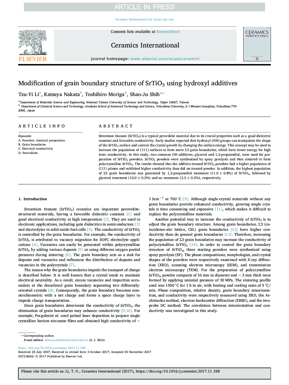 Modification of grain boundary structure of SrTiO3 using hydroxyl additives