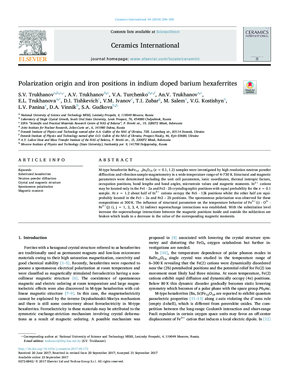 Polarization origin and iron positions in indium doped barium hexaferrites