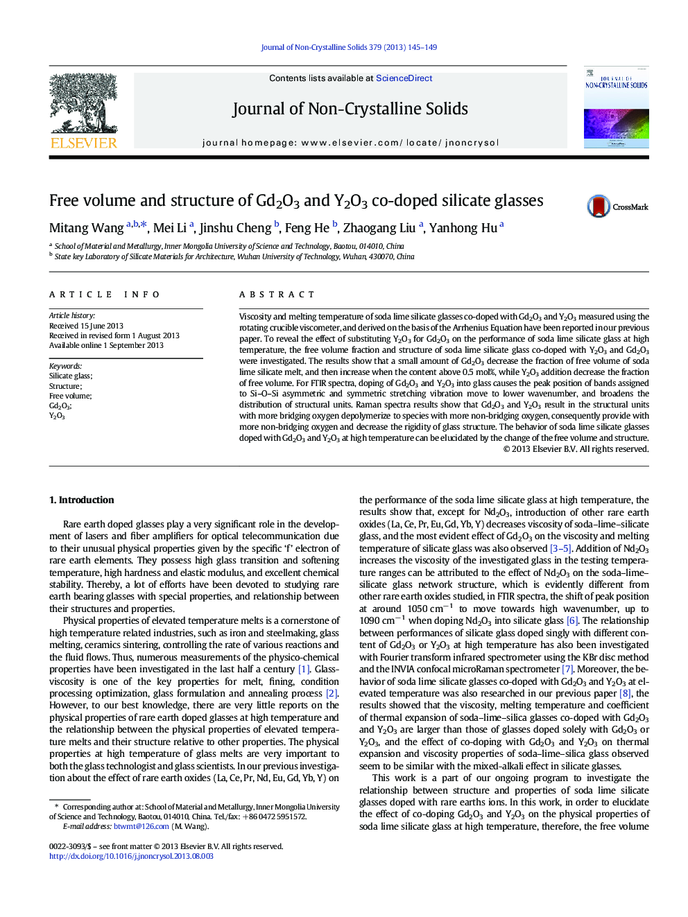 Free volume and structure of Gd2O3 and Y2O3 co-doped silicate glasses