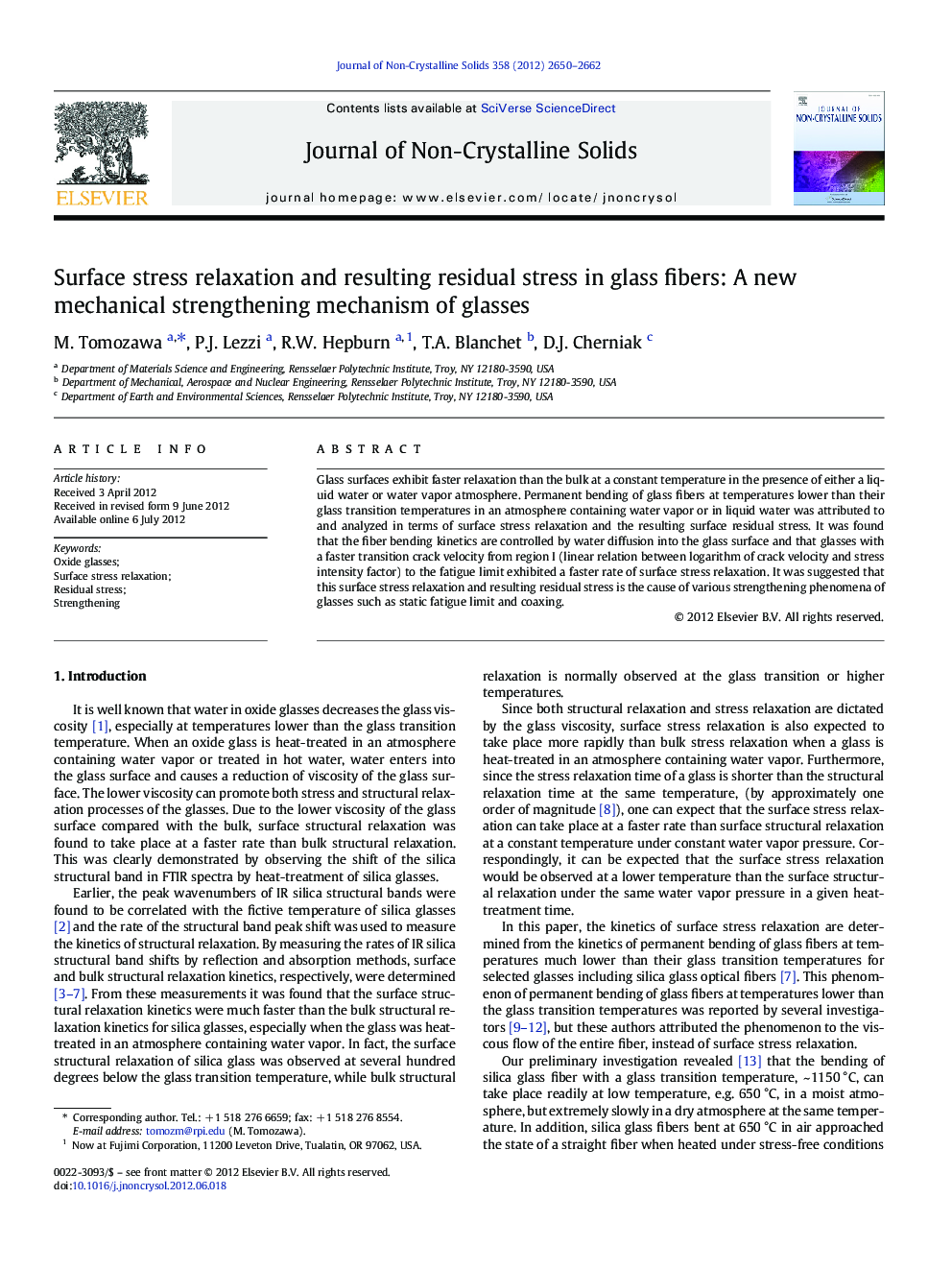 Surface stress relaxation and resulting residual stress in glass fibers: A new mechanical strengthening mechanism of glasses