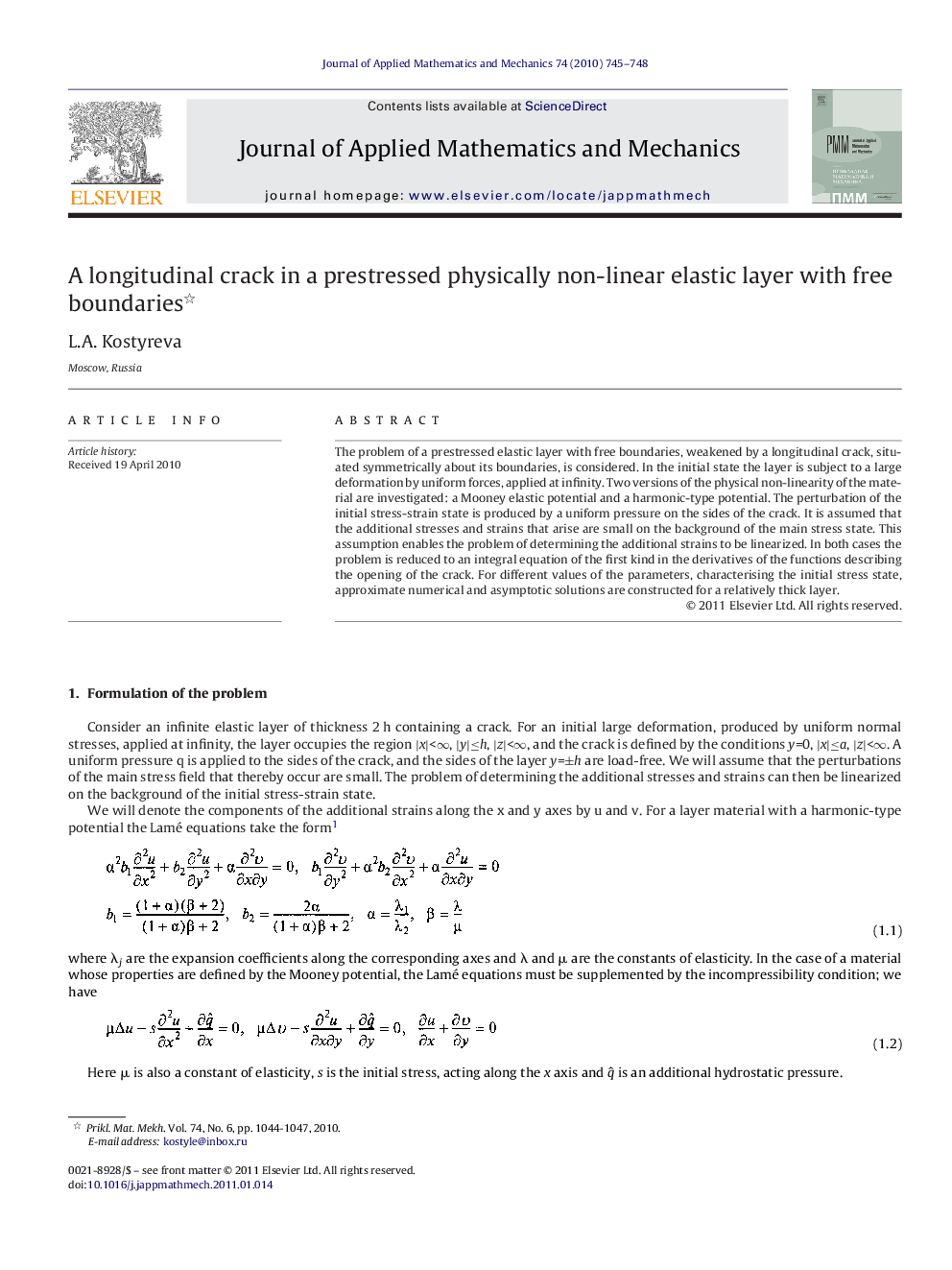 A longitudinal crack in a prestressed physically non-linear elastic layer with free boundaries 