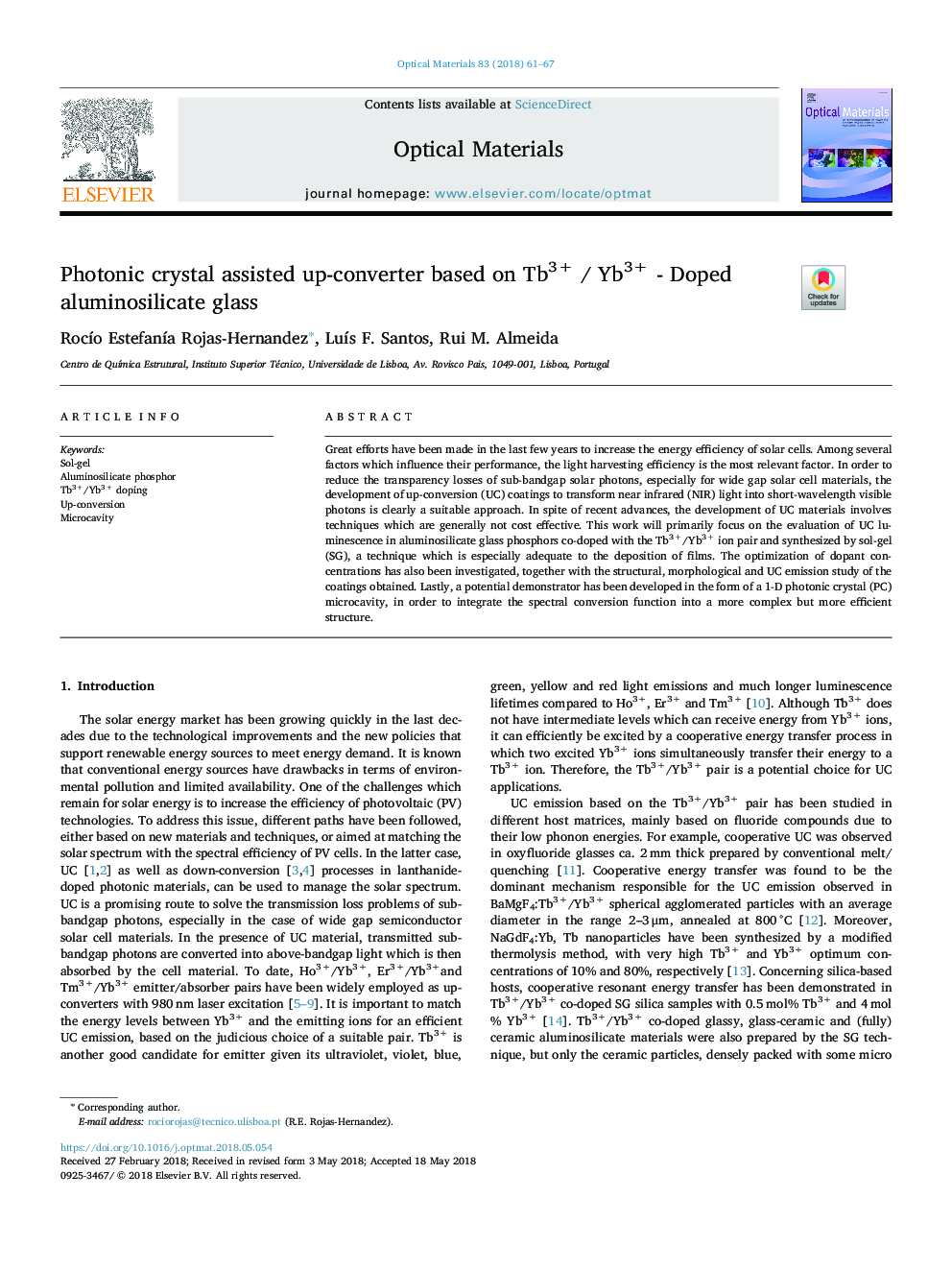 Photonic crystal assisted up-converter based on Tb3+ / Yb3+ - Doped aluminosilicate glass