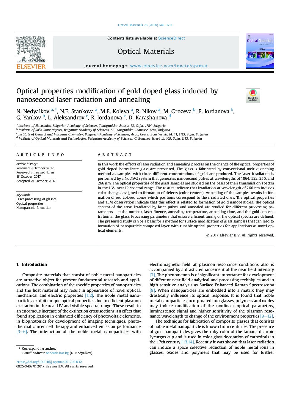 Optical properties modification of gold doped glass induced by nanosecond laser radiation and annealing