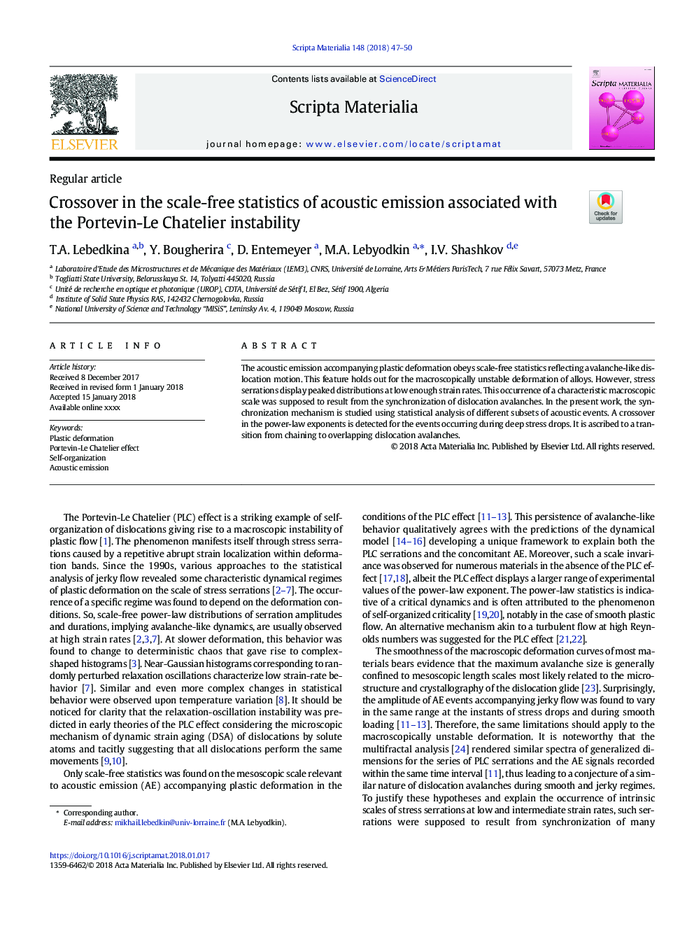Crossover in the scale-free statistics of acoustic emission associated with the Portevin-Le Chatelier instability
